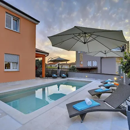 Modern With Pool And Parasol In *